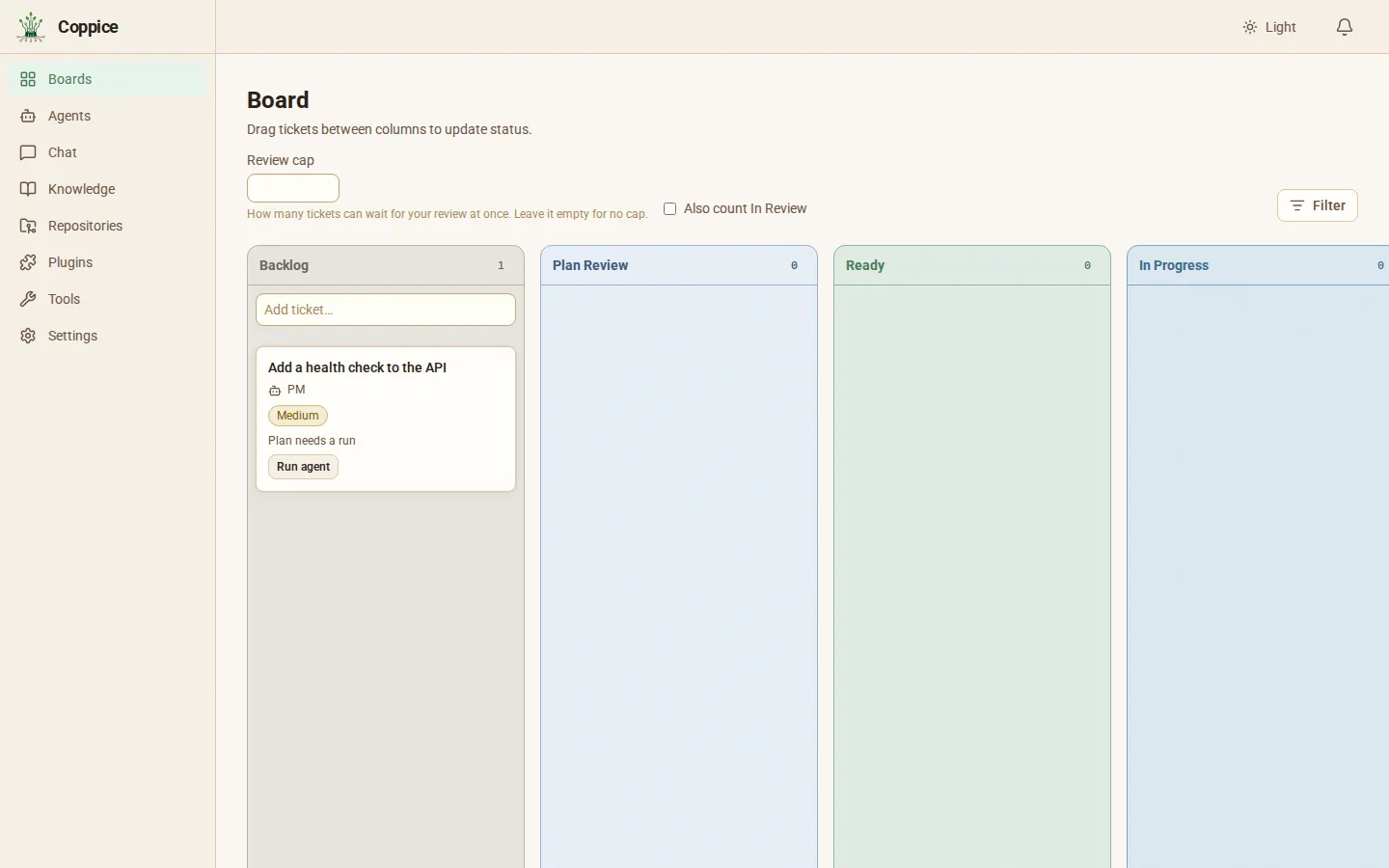 A board with a new ticket in Backlog and the Run agent button showing.